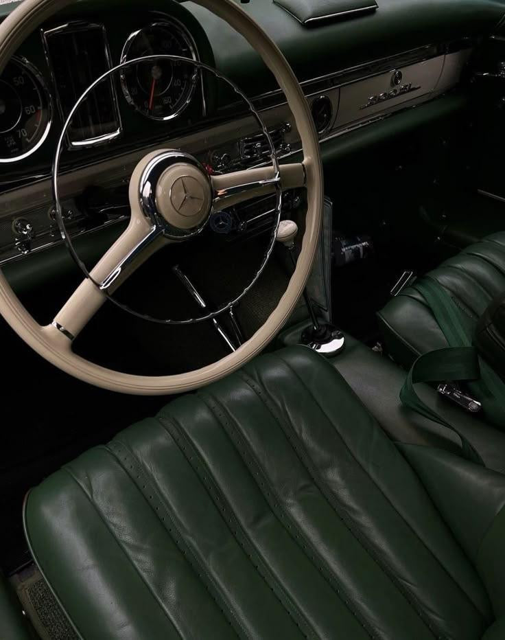 Vintage car interior with steering wheel and dashboard